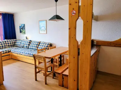 Coin salon dans l'établissement Appartement 6 pers · Balcon · Wifi gratuit · Parking - FR-1-346-559