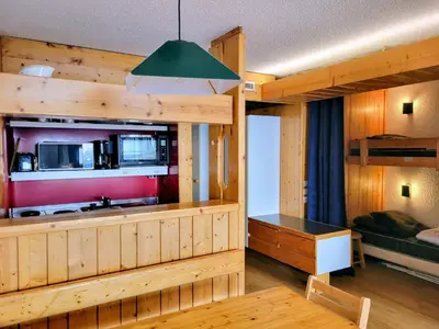 Cuisine ou kitchenette dans l'établissement Appartement 6 pers · Balcon · Wifi gratuit · Parking - FR-1-346-559