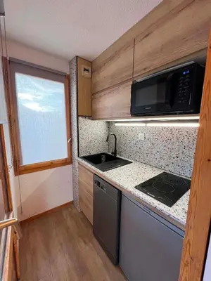 Cuisine ou kitchenette dans l'établissement Appartement 1 chambre Croix du Sud Belle Plagne