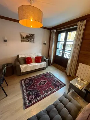 Coin salon dans l'établissement Adorable 30m2 Coeur de Val 1 chambre 2 lits
