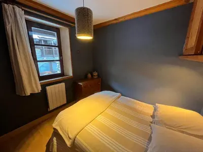 Un ou plusieurs lits dans un hébergement de l'établissement Adorable 30m2 Coeur de Val 1 chambre 2 lits
