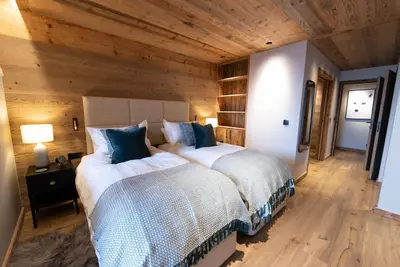 Un ou plusieurs lits dans un hébergement de l'établissement Chalet Chalmers