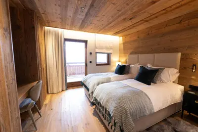 Un ou plusieurs lits dans un hébergement de l'établissement Chalet Chalmers
