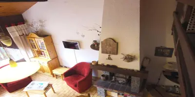 Coin salon dans l'établissement Résidence Ancolie - Les Hauts De Planchamp - 2 Pièces pour 6 Personnes MAE-6374