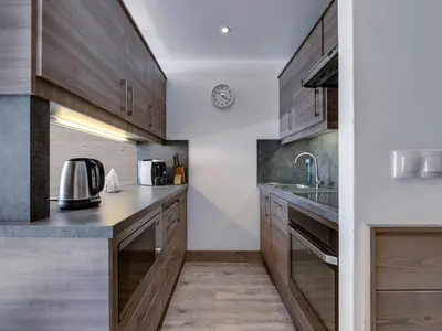 Cuisine ou kitchenette dans l'établissement Appartement lumineux au Val Claret, proche pistes et commerces - FR-1-641-26