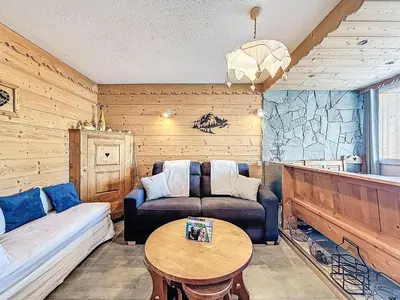 Coin salon dans l'établissement Apartment Les Grandes Balmes I et II - Le Lac-11 by Interhome