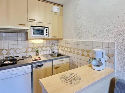 Cuisine ou kitchenette dans l'établissement Studio 4 pers avec parking au Lavachet - FR-1-411-904