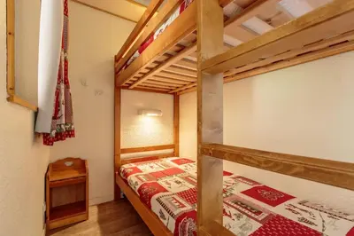 Un ou plusieurs lits dans un hébergement de l'établissement Bel appartement vue montagne