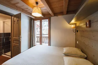 Un ou plusieurs lits dans un hébergement de l'établissement Chalet Bio Corti 6p. 3 ch proche pistes/commerces