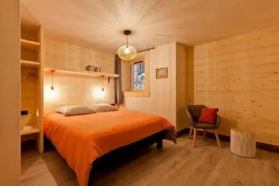 Un ou plusieurs lits dans un hébergement de l'établissement Lodge 10 personnes proche pistes et commerces belle vue