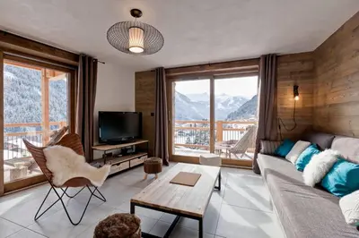 Télévision ou salle de divertissement dans l'établissement Lodge 10 personnes proche pistes et commerces belle vue