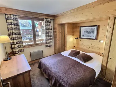 Un ou plusieurs lits dans un hébergement de l'établissement Résidence Aquila - Superbe appartement 3 pièces cabine pour 8 personnes situé à Val d’Isère, skis aux pieds et à 500m du centre du village, navette MAE-2544