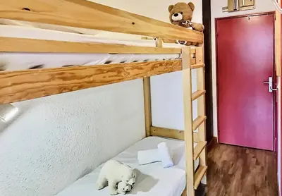 Un ou plusieurs lits dans un hébergement de l'établissement Résidence Home Club - Studio 4 personnes + parking au coeur du Lavachet MAE-2954
