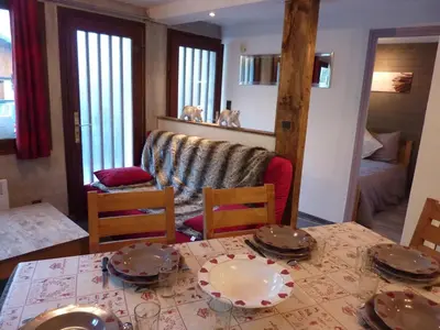 Coin salon dans l'établissement Chalet le chamois