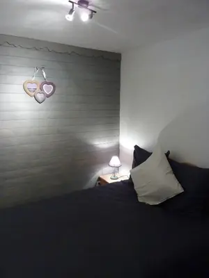 Un ou plusieurs lits dans un hébergement de l'établissement Chalet le chamois