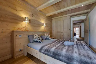 Un ou plusieurs lits dans un hébergement de l'établissement CHALET AROLAY