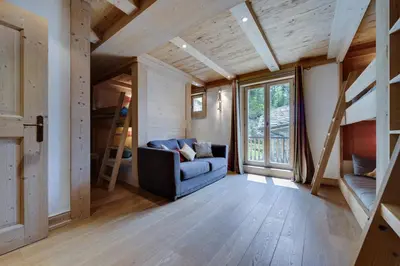 Coin salon dans l'établissement CHALET AROLAY