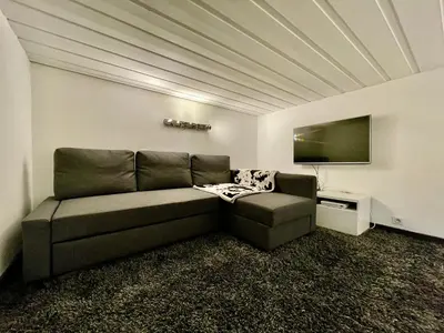 Coin salon dans l'établissement Ski in-Ski out! Spacious & Stylish Apartment for 8 in the heart of Lavachet