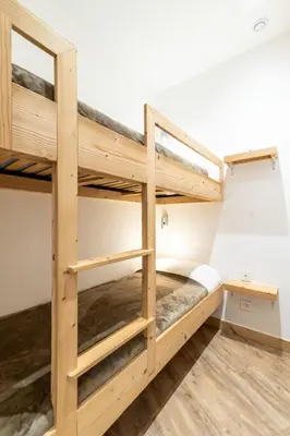 Un ou plusieurs lits superposés dans un hébergement de l'établissement Apartment Le Hameau du Borsat - Val Claret-14 by Interhome