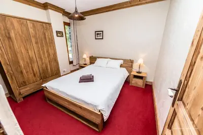 Un ou plusieurs lits dans un hébergement de l'établissement Chalet Ancolie