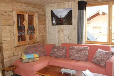 Coin salon dans l'établissement Chalet Pomme de Pin
