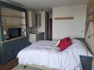 Un ou plusieurs lits dans un hébergement de l'établissement Tignes Studio 20m² - 2 pers, Balcon, Vue Montagne - FR-1-449-192
