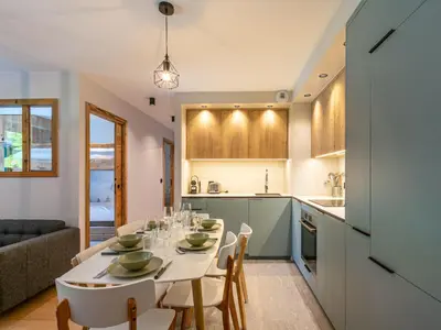 Cuisine ou kitchenette dans l'établissement Cocon intime avec WiFi et garage au pied des pistes – résidence neuve de standing - FR-1-694-338