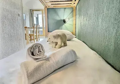 Un ou plusieurs lits dans un hébergement de l'établissement Résidence Home Club - Bel appartement rénové pouvant acueillir 4 personnes à Tignes Lavachet MAE-2184
