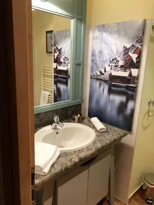Salle de bains dans l'établissement Appartement T3 ARC 1950 skis aux pieds Sauna, Hammam, Jacuzzi