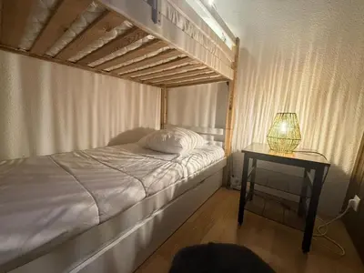 Un ou plusieurs lits dans un hébergement de l'établissement Sefcotel - Studio Cabine COSY MAE-3024