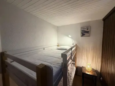 Un ou plusieurs lits dans un hébergement de l'établissement Sefcotel - Studio Cabine COSY MAE-3024
