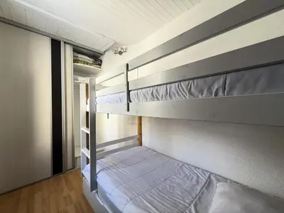 Un ou plusieurs lits dans un hébergement de l'établissement Sefcotel - Studio Cabine COSY MAE-3024