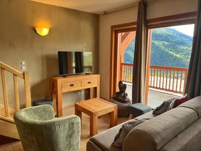 Télévision ou salle de divertissement dans l'établissement Time to Ski - Belle Vue