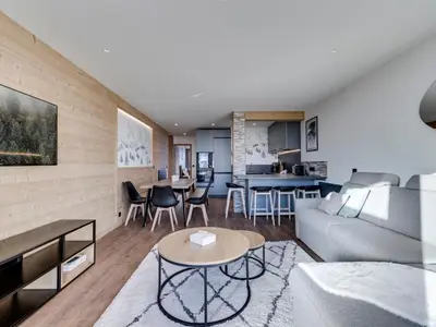 Coin salon dans l'établissement Appartement rénové, près des pistes, pour 8 personnes - FR-1-641-32