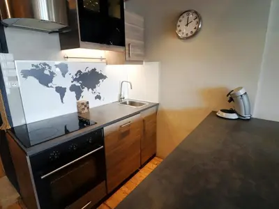 Cuisine ou kitchenette dans l'établissement Appartement confortable au pied des pistes - 6 personnes - FR-1-502-546