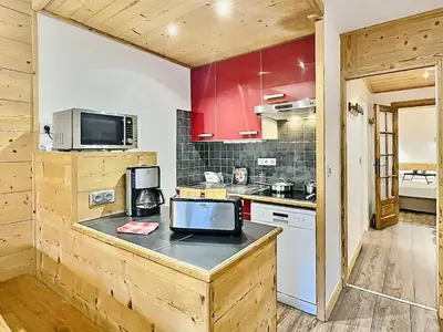 Cuisine ou kitchenette dans l'établissement Sublime T2 rénové proche centre Val Claret pour 6 personnes - FR-1-411-914