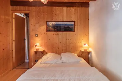 Un ou plusieurs lits dans un hébergement de l'établissement Magnifique chalet Mistouflon