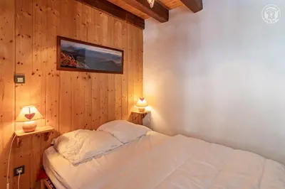 Un ou plusieurs lits dans un hébergement de l'établissement Magnifique chalet Mistouflon