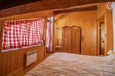 Un ou plusieurs lits dans un hébergement de l'établissement Magnifique chalet Mistouflon