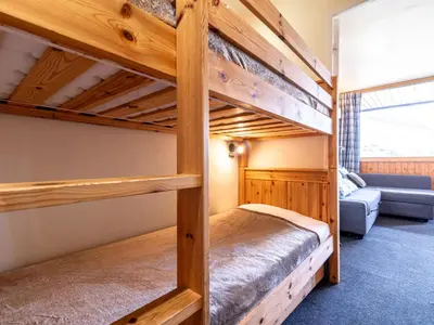 Un ou plusieurs lits dans un hébergement de l'établissement Studio Home Club - Lavachet-12 by Interhome