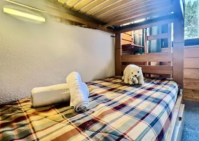 Un ou plusieurs lits dans un hébergement de l'établissement Résidence Le Villaret - 2 pièces spacieux pour 5 personnes situé au pied des pistes de 