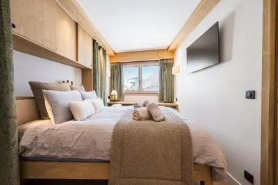 Un ou plusieurs lits dans un hébergement de l'établissement Tignes le Lac - Appartement 8p - Pied des pistes