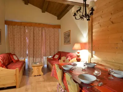 Coin salon dans l'établissement Charmant appartement rénové 2 pièces + cabine, accès piste, animaux admis - FR-1-181-2754