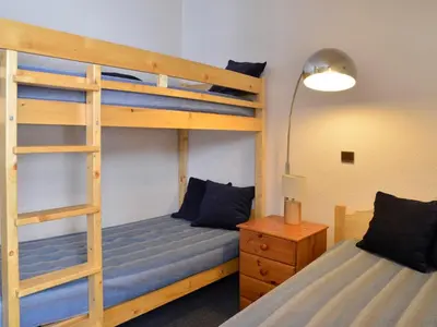 Un ou plusieurs lits dans un hébergement de l'établissement Appartement tout confort Accès direct aux pistes Vue pistes Balcon - FR-1-181-2773