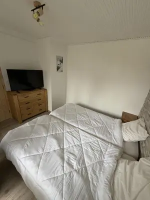 Un ou plusieurs lits dans un hébergement de l'établissement Appartement Tignes 2100 - 6-8 personnes - 2 chambres - 3 Télévisions - Wifi inclus