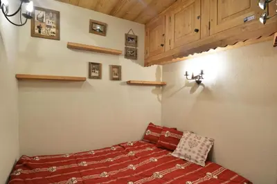 Un ou plusieurs lits dans un hébergement de l'établissement Résidence Callisto - Charmant appartement · Accès direct aux pistes · Vue pistes MAE-6401