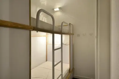 Un ou plusieurs lits dans un hébergement de l'établissement Résidence Licorne - Appartement tout confort divisible · Accès direct aux pistes · Balcon MAE-6541