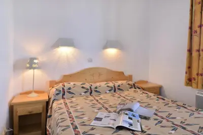 Un ou plusieurs lits dans un hébergement de l'établissement Résidence Licorne - Appartement tout confort divisible · Accès direct aux pistes · Balcon MAE-6541