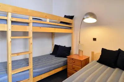 Un ou plusieurs lits dans un hébergement de l'établissement Résidence Onyx - Appartement tout confort · Accès direct aux pistes MAE-6551