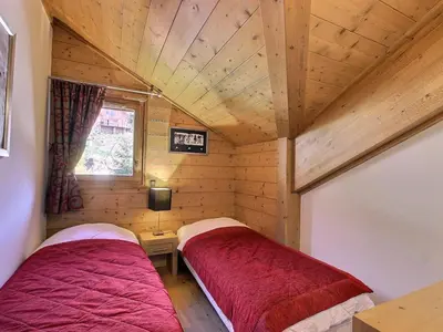Un ou plusieurs lits dans un hébergement de l'établissement Appartement skis aux pieds pour 6 pers proche centre Vallandry, animaux admis - FR-1-411-918